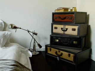 Illustration for article titled Retrotastic Furniture Made from Amazing Old Suitcases and Trunks